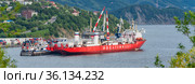Container cargo ship nuclear powered icebreaker Sevmorput Russian Corporation FSUE Rosatomflot unloaded container terminal commercial sea port of Northern Sea Route (2019 год). Редакционное фото, фотограф А. А. Пирагис / Фотобанк Лори