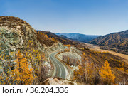 View from the Chike-Taman pass to the valley, mountains, and the Chuisky tract in autumn. Altai Republic, Russia. Стоковое фото, фотограф Наталья Волкова / Фотобанк Лори