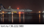 Airplane of SkyTeam livery in Sheremetyevo Airport at rainy night (2017 год). Редакционное фото, фотограф Данил Руденко / Фотобанк Лори