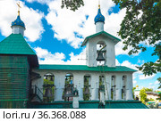 Город Печоры. Свято-Успенский Псково-Печерский монастырь. Главная монастырская колокольня. Вид со стороны Монастырского сада. (2016 год). Стоковое фото, фотограф Зобков Юрий / Фотобанк Лори