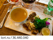 Young bull meat in its own juice with herbs. Khashlama. Стоковое фото, фотограф Яков Филимонов / Фотобанк Лори