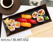 Set of different sushi - makis, uramaki and nigiris. Стоковое фото, фотограф Яков Филимонов / Фотобанк Лори