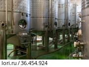 Metallic cisterns for processing and fermentating wine in shop. Стоковое фото, фотограф Яков Филимонов / Фотобанк Лори