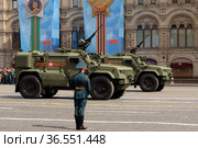 Бронеавтомобиль многоцелевого назначения "Тайфун-ПВО" с боевым модулем дистанционного управления "Корд" во время генеральной репетиции военного парада на Красной площади в Москве (2021 год). Редакционное фото, фотограф Free Wind / Фотобанк Лори