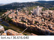 View from drone of Girona on bank of Onyar river. Стоковое фото, фотограф Яков Филимонов / Фотобанк Лори