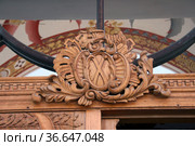 Деревянный картуш с буквой "Х" над входом в храм. Храм Николая Чудотворца. Крым, село Малореченское (2021 год). Стоковое фото, фотограф Щеголева Ольга / Фотобанк Лори