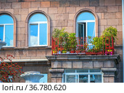 beautiful vintage balcony decorated with flowers (2021 год). Стоковое фото, фотограф Акиньшин Владимир / Фотобанк Лори