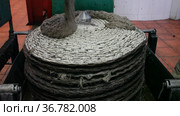 Process of forming stack of fiber mats with milled olive paste, preparing to press on artisanal olive oil factory. Стоковое видео, видеограф Яков Филимонов / Фотобанк Лори