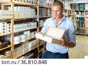 Man with sundries storage box. Стоковое фото, фотограф Яков Филимонов / Фотобанк Лори
