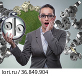 Businesswoman suprised about high interest mortgage rates. Стоковое фото, фотограф Elnur / Фотобанк Лори