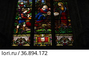 DIEPPE, FRANCE - SEPTEMBER 17, 2021: Stained glass with a scene of the birth of Jesus Christ. Редакционное видео, видеограф Irina Kuchugurina/Gaudy / Фотобанк Лори