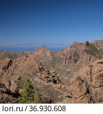 Gran Canaria, landscape of the central montainous part of the island, Las Cumbres, ie The Summits, Ventana de Cuchillon rock arch Landscapes around popular hiking route camino de la Plata (2021 год). Стоковое фото, фотограф Tamara Kulikova / Фотобанк Лори