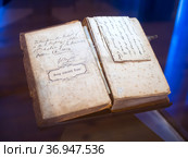 Молитвослов 19 века, экспозиция Михайловской батареи, Севасторполь, Крым (2020 год). Редакционное фото, фотограф Вячеслав Палес / Фотобанк Лори