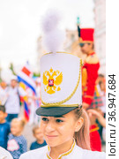 Russia, Samara, July 2019: a beautiful girl in a hussar costume on Kuibyshev street at the carnival dedicated to the World Cup. Редакционное фото, фотограф Акиньшин Владимир / Фотобанк Лори