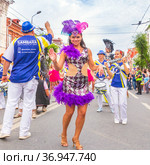 Russia, Samara, July 2019: processions of beautiful dressed up girls on Kuibyshev street at the carnival dedicated to the World Cup. Редакционное фото, фотограф Акиньшин Владимир / Фотобанк Лори