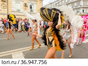 Russia, Samara, July 2019: processions of beautiful dressed up girls on Kuibyshev street at the carnival dedicated to the World Cup. Редакционное фото, фотограф Акиньшин Владимир / Фотобанк Лори