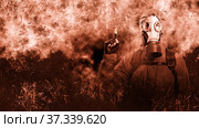 A shot of a man dressed in a gas mask, a jacket with a hood, a backpack, points his index finger up, looks into the camera. A poster on the background of grunge. Стоковое фото, фотограф Владимир Арсентьев / Фотобанк Лори