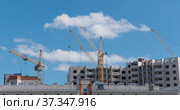 Time lapse of Building Under Construction, Crane and beautiful clouds no birds. Стоковое фото, фотограф Фотограф / Фотобанк Лори
