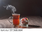 Turkish tea and sweets on a wooden table. Стоковое фото, фотограф Андрей Никитин / Фотобанк Лори