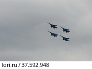 Авиационная группа высшего пилотажа "Русские витязи" в небе на Международном авиационно-космическом салоне МАКС-2021 в Жуковском, Россия. Редакционное фото, фотограф Free Wind / Фотобанк Лори