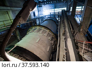 Grey factory mill in factory workshop of phosphoric fertilizers plant. Panorama view. No people. Стоковое фото, фотограф Alexey Rezvykh / Фотобанк Лори