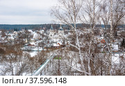 View of town Vereya, Church of the Epiphany and bridge over river Protva in winter, Naro-Fominsky District, Moscow Oblast, Russia (2016 год). Стоковое фото, фотограф Алексей Антипов / Фотобанк Лори