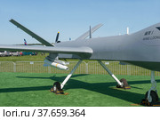Китайский новый высотный ударный военный БПЛА Wing Loong II на Международном авиасалоне МАКС-2019 в Жуковском, Россия, вид на двигатель. Редакционное фото, фотограф Малышев Андрей / Фотобанк Лори
