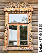 Architectural details - beautiful window framing near old wooden houses. Traditional Russian culture (2019 год). Стоковое фото, фотограф Алексей Кокоулин / Фотобанк Лори