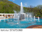 Fountain in the form of mugs in the resort park in Zheleznovodsk, Stavropol Territory, Russia - May 1, 2021. Редакционное фото, фотограф Наталия Попова / Фотобанк Лори