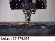 Modern laser precision CNC cutting machine. Стоковое фото, фотограф Alexey Rezvykh / Фотобанк Лори