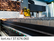 Modern laser precision CNC cutting machine. (2012 год). Редакционное фото, фотограф Alexey Rezvykh / Фотобанк Лори