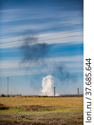 Panorama view on steppe and explosion. White cloud and black smoke. Coal quarry in Kazakhstan. Beautiful sky with clouds. Стоковое фото, фотограф Alexey Rezvykh / Фотобанк Лори