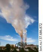 Pavlodar thermal electric station. Smoke stacks with white smoke. Стоковое фото, фотограф Alexey Rezvykh / Фотобанк Лори