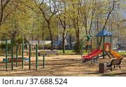 MOSCOW, RUSSIA - APRIL 29, 2022: Playground in Park of Shota Rustaveli in spring. Редакционное фото, фотограф Валерия Попова / Фотобанк Лори