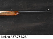 Smoothbore hunting gun on black background close up. Стоковое фото, фотограф Сергей Толмачёв / Фотобанк Лори