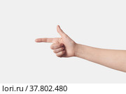 Pointing with one finger woman right hand on white. Стоковое фото, фотограф Ярослав Данильченко / Фотобанк Лори