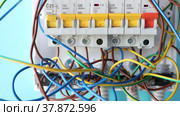 Fuse box panel installation at home, electrical work with household electricity. Стоковое видео, видеограф Владимир Григорьев / Фотобанк Лори