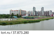Санкт-Петербург летом, Приморский район. Многоэтажная застройка города. Вид с воздуха. Saint Petersburg in summer, Primorsky district. Multi-storey buildings of the city. Aerial view. (2022 год). Стоковое видео, видеограф Евгений Романов / Фотобанк Лори