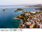 Aerial view of coastal area of Albanian city of Ksamil on Mediterranean Sea. Стоковое фото, фотограф Яков Филимонов / Фотобанк Лори