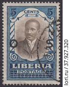 Президент Дэниел Эдвард Говард (1861-1935), надпечатка OS. Почтовая марка Либерии 1920 года. Редакционная иллюстрация, иллюстратор александр афанасьев / Фотобанк Лори