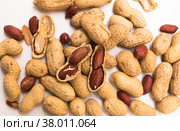 bunch of ecological peanuts on a white background. Стоковое фото, фотограф Татьяна Яцевич / Фотобанк Лори