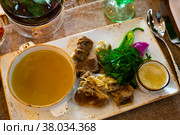 Khashlama - brisket of a young bull in its own juice with herbs. Стоковое фото, фотограф Яков Филимонов / Фотобанк Лори