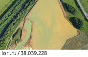Gold mining. Flushing the rock with an old dredge. View from above. Environmental pollution. Стоковое видео, видеограф Евгений Ткачёв / Фотобанк Лори