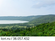 Natural landscape of Kunashir island, view of the Golovnin volcano caldera with hot lakes. Стоковое фото, фотограф Евгений Харитонов / Фотобанк Лори