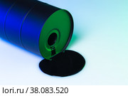 Black oil barrel with oil drop on white background. Стоковое фото, фотограф Сергей Толмачёв / Фотобанк Лори