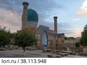 Gur-Emir (Mausoleum of Tamerlane) - medieval mausoleum tomb of the Timurid dynasty on a cloudy morning. Samarkand, Uzbekistan (2022 год). Стоковое фото, фотограф Виктор Карасев / Фотобанк Лори