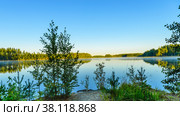 View of the lake from the shore from the shore at sunrise. Morning mist.Haukivesi lake, Saimaa lake system, Savo, Finland. Стоковое фото, фотограф Михаил Аккуратoв / Фотобанк Лори