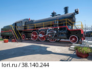 Советский пассажирский паровоз серии "Су" (1924-1951 гг.) солнечным днем. Музей железнодорожного транспорта. Ташкент (2022 год). Редакционное фото, фотограф Виктор Карасев / Фотобанк Лори