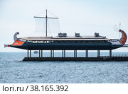 The historic warship of the galley is set at the seashore. The Viking ship Drakkar is one of the most recognizable sailing ships in the world. (2021 год). Редакционное фото, фотограф Иветта Александровна Эйвазова / Фотобанк Лори