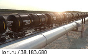 Gas transportation via gas main pipeline and diesel fuel delivering on railroad. Стоковое видео, видеограф Олег Грач / Фотобанк Лори